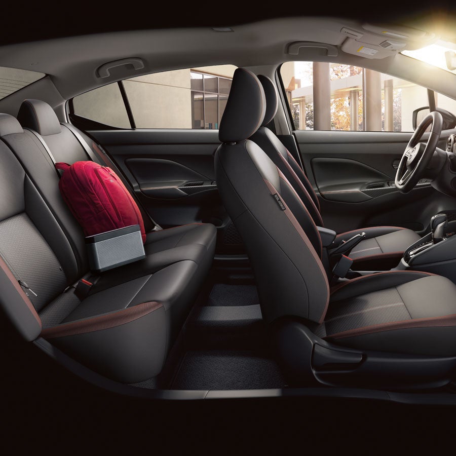 2025 Nissan Versa interior view showing front and rear seating