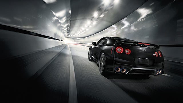 2023 Nissan GT-R seen from behind driving through a tunnel | Bennington Nissan in Bennington VT